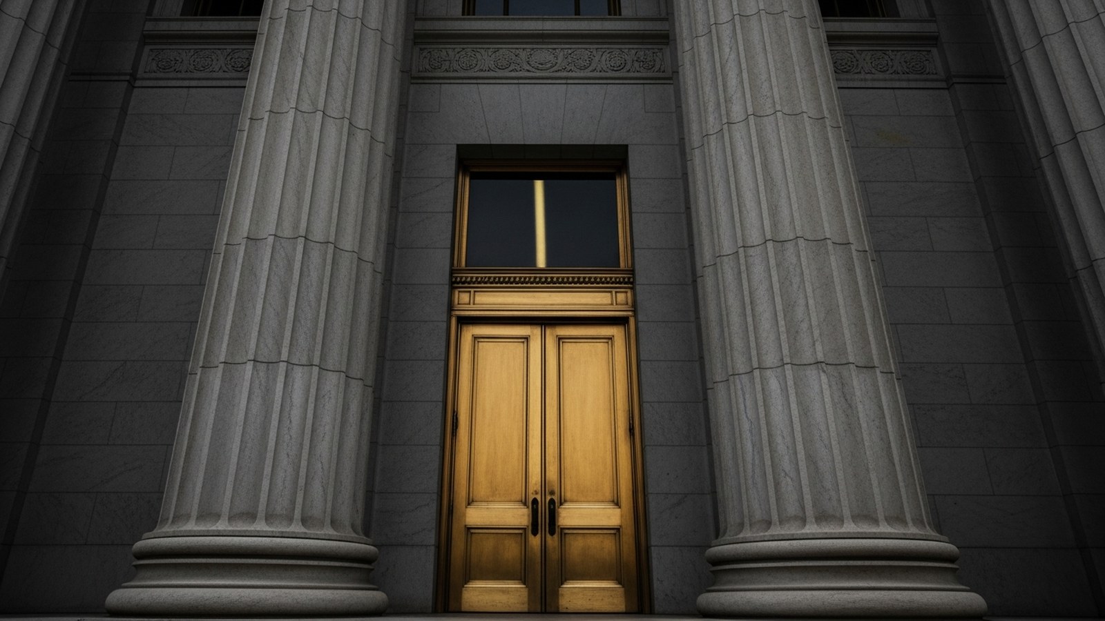 A grand bank facade under a stormy sky