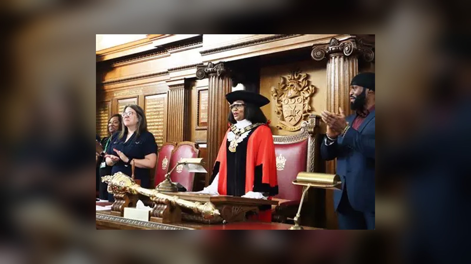 Mayor Rosaline Ogunro in robes and chain of office in the council chamber